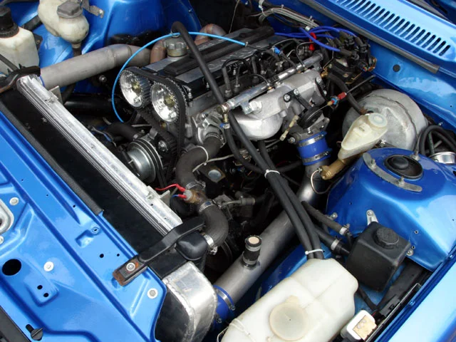 0402_03z+1975_volvo_240+engine_bay_view.webp