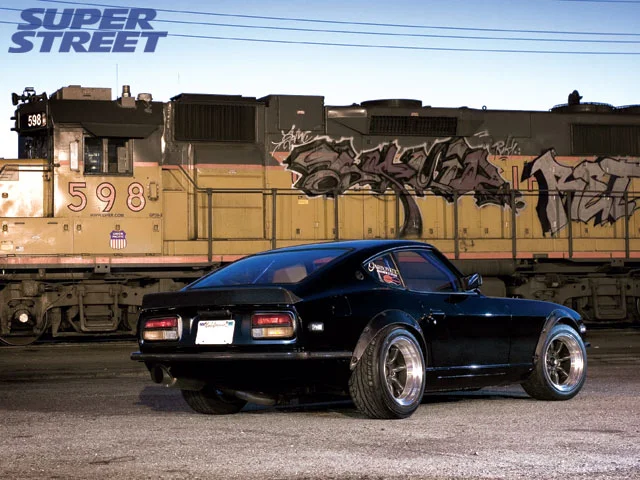 130_0711_18_z+1970_datsun_240z+rear_view.webp