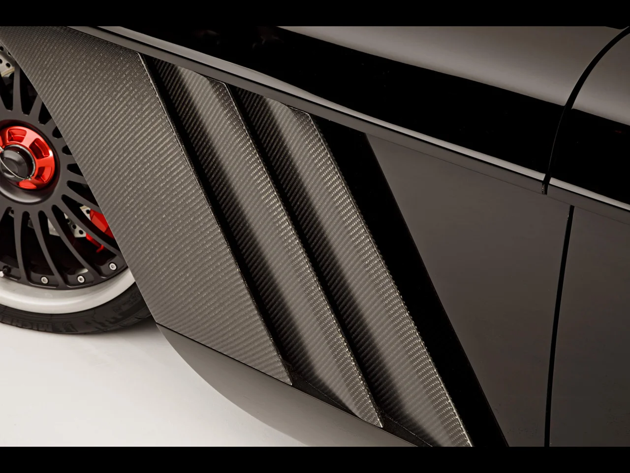 1962-Chevrolet-Corvette-C1-RS-by-Roadster-Shop-Carbon-Fiber-Louvers-1280x960.webp
