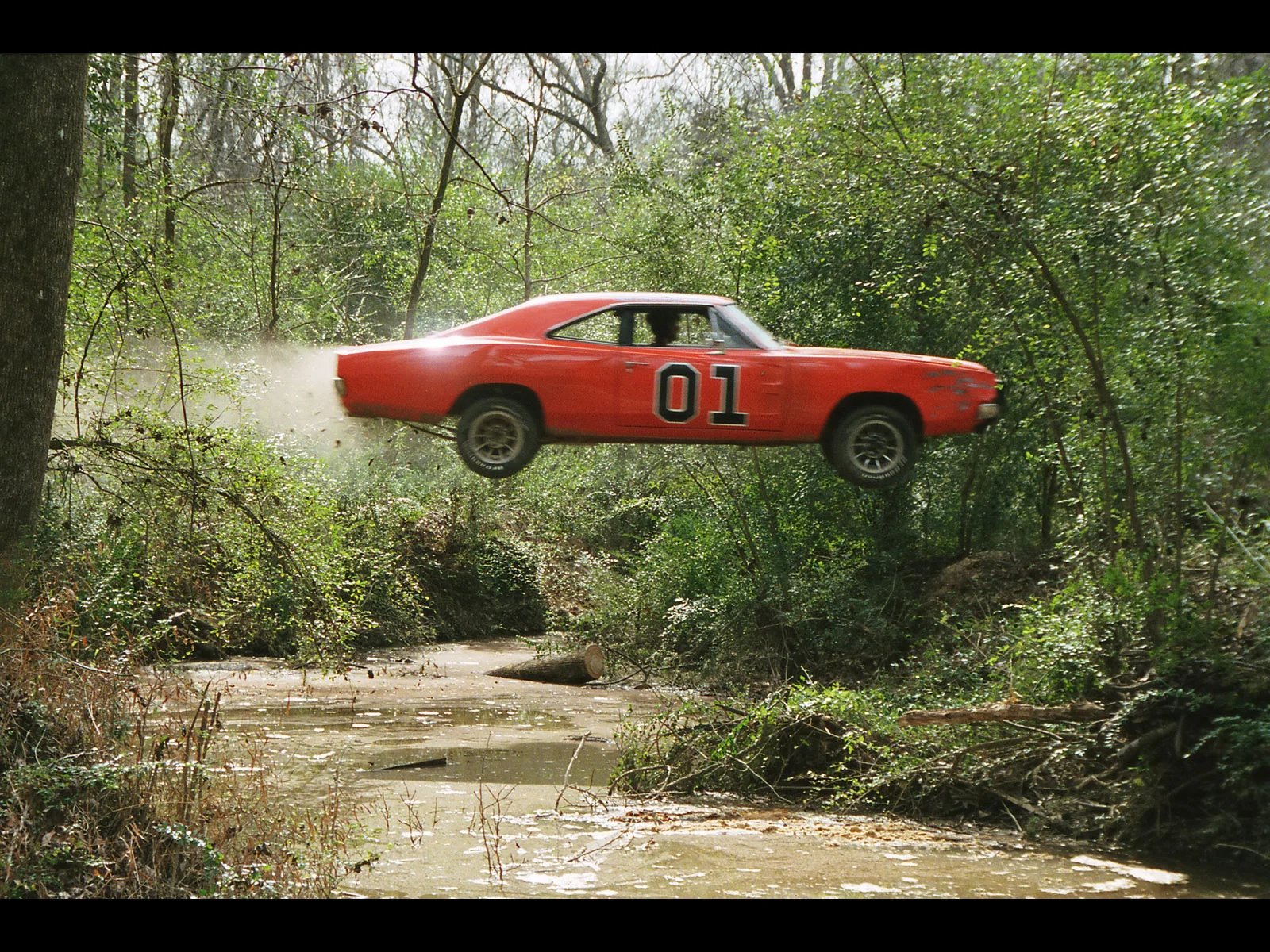 1969-Dodge-Charger-General-Lee-DOH-Jump-Swamp-1600x1200.webp