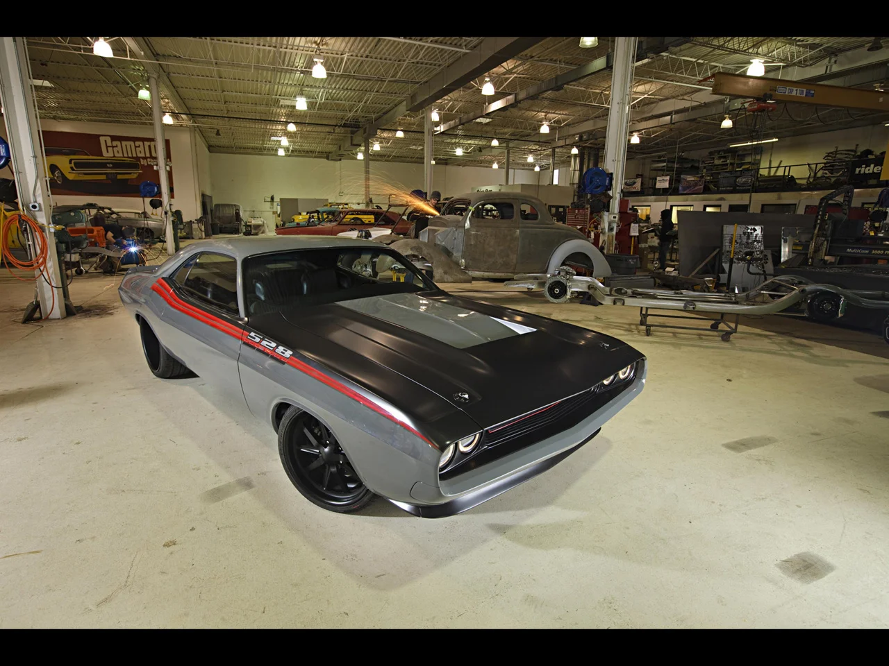 1970-Dodge-Challenger-by-Roadster-Shop-Front-Angle-1280x960.webp