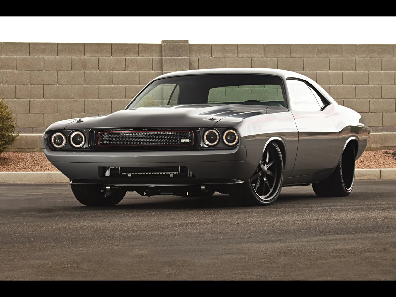1970-Dodge-Challenger-by-Roadster-Shop-Front-Angle-2-1280x960.webp