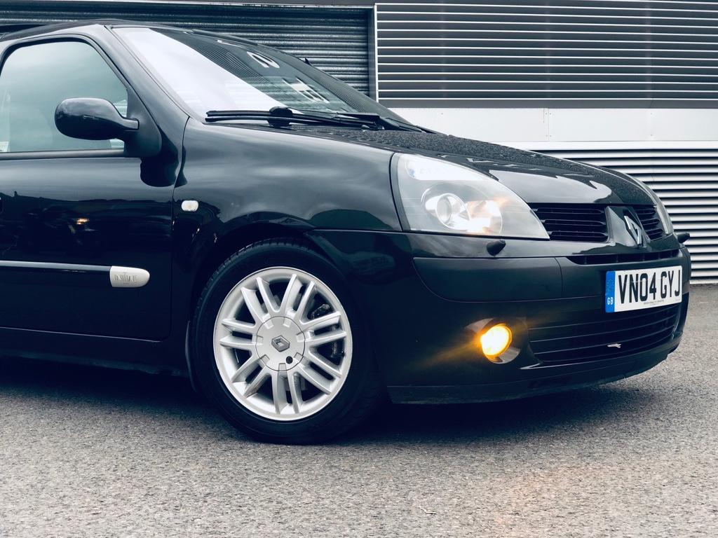 Blue Silver Renault Clio 2 0 16V Viewed Against Dramatic Sky Stock