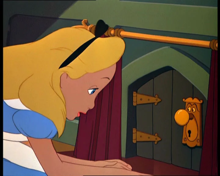 alice-with-doorknob1.webp