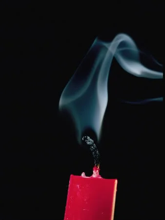 brian-green-red-candle-with-smoke-c.webp