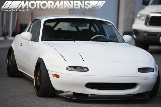 clean-and-simple-Maxda-MX5-on-bronze-works-wheels.webp