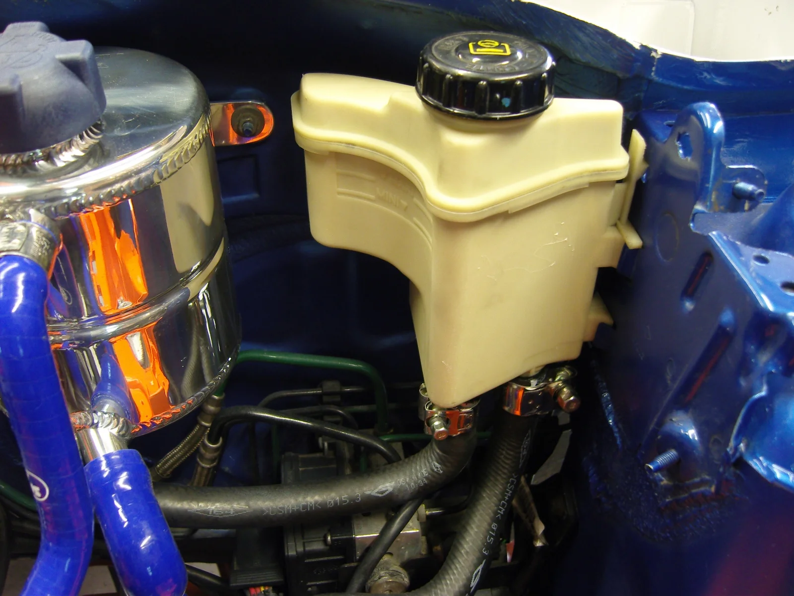 cleanpowersteeringbottle.webp