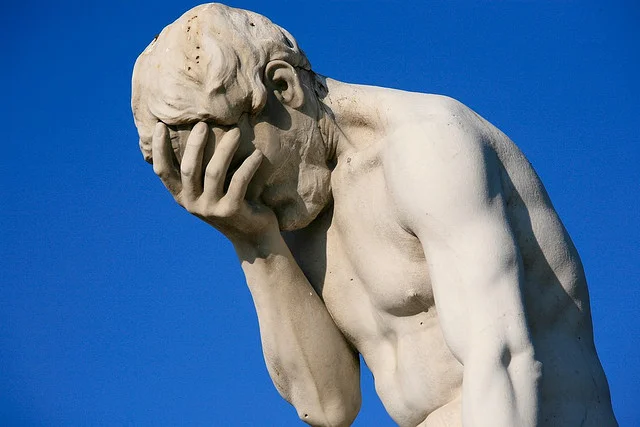 facepalm+statue.webp