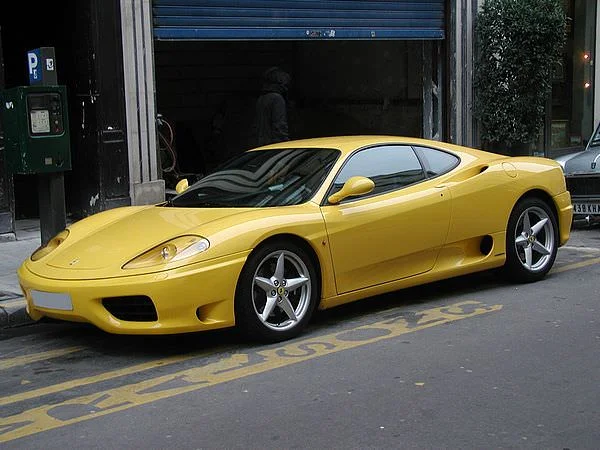 Ferrari.yellow.xx.webp