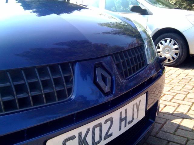 frontgreybadge.jpg frontgreybadge.jpg