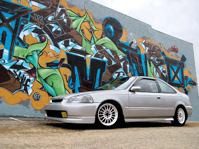 htup_0808_01_z+1996_honda_civic_coupe_ej+side_view_cool_graffiti_background.webp