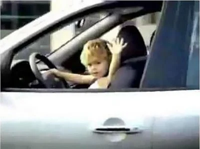 kid_driving_car.webp
