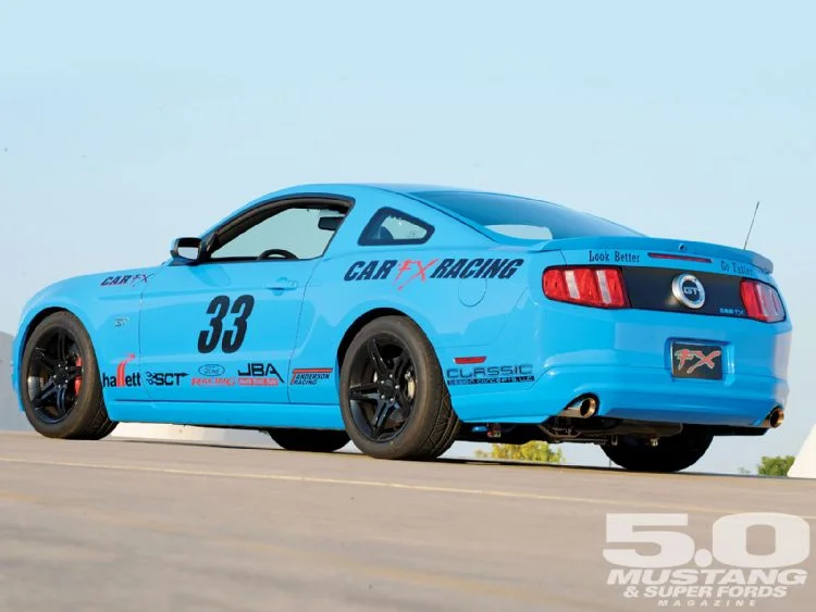 m5lp_0912_03_+2010_mustang_gt+rear_view.webp