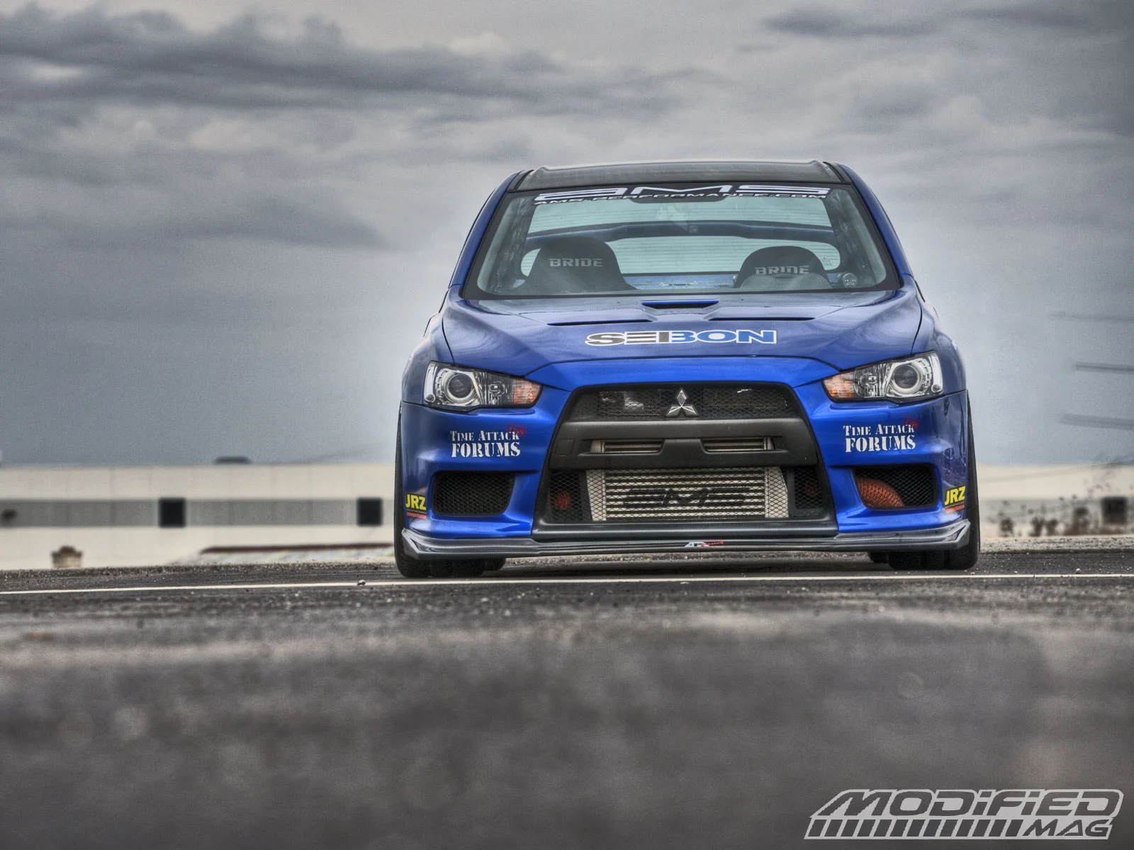 modp_0907_01_o+2008_mitsubishi_lancer_evo_x+front.webp