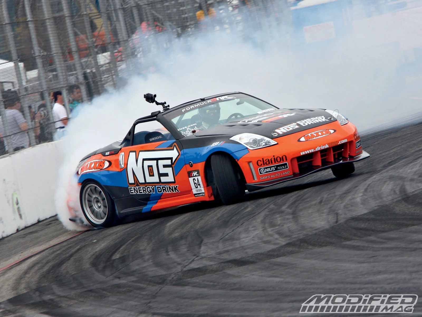 modp_0908_11_o+2009_formula_drift_round_1+chris_forsberg_nissan_350z.webp