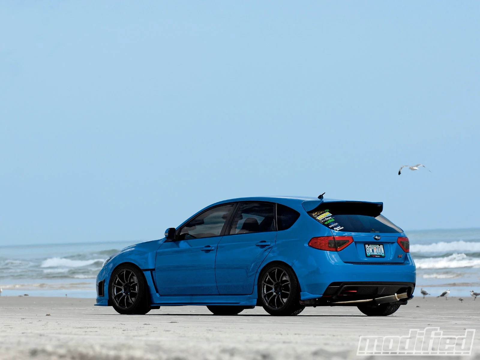 modp_1004_02_o+2008_subaru_impreza_sti+driver_side.webp