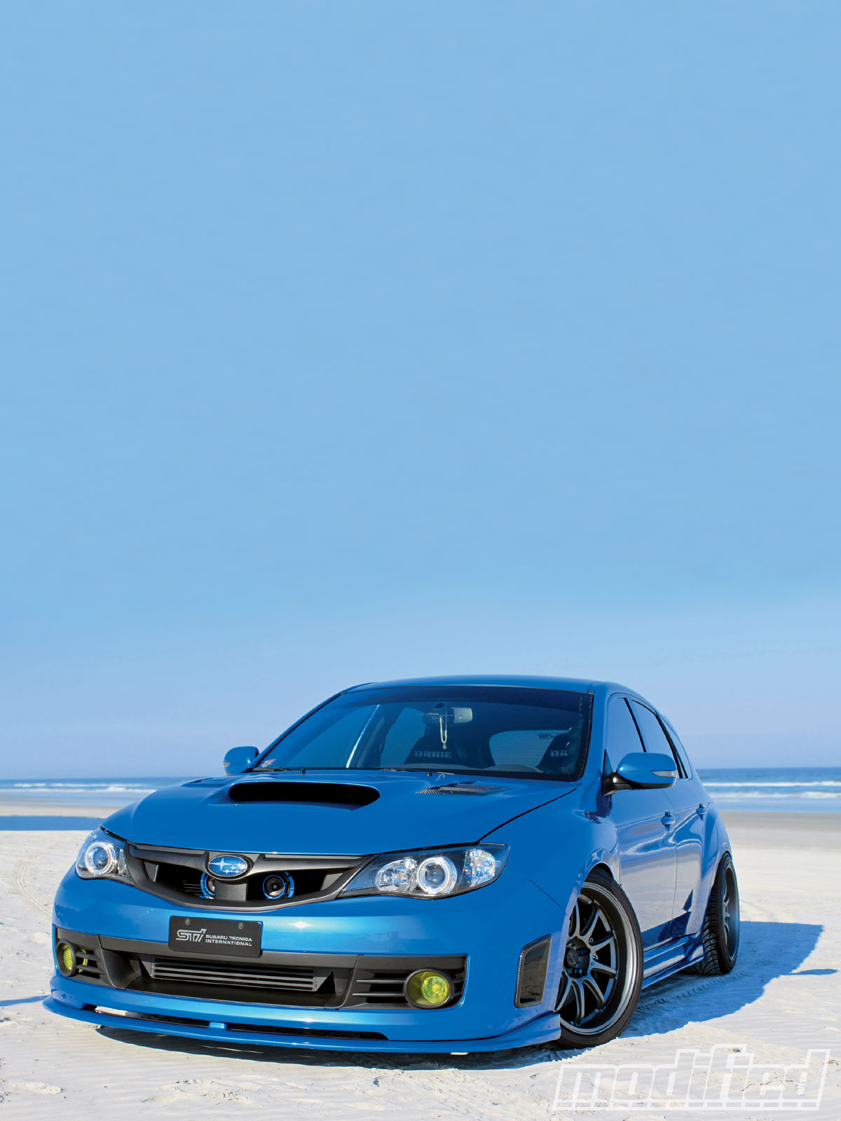 modp_1004_12_o+2008_subaru_impreza_sti+full_view.jpg