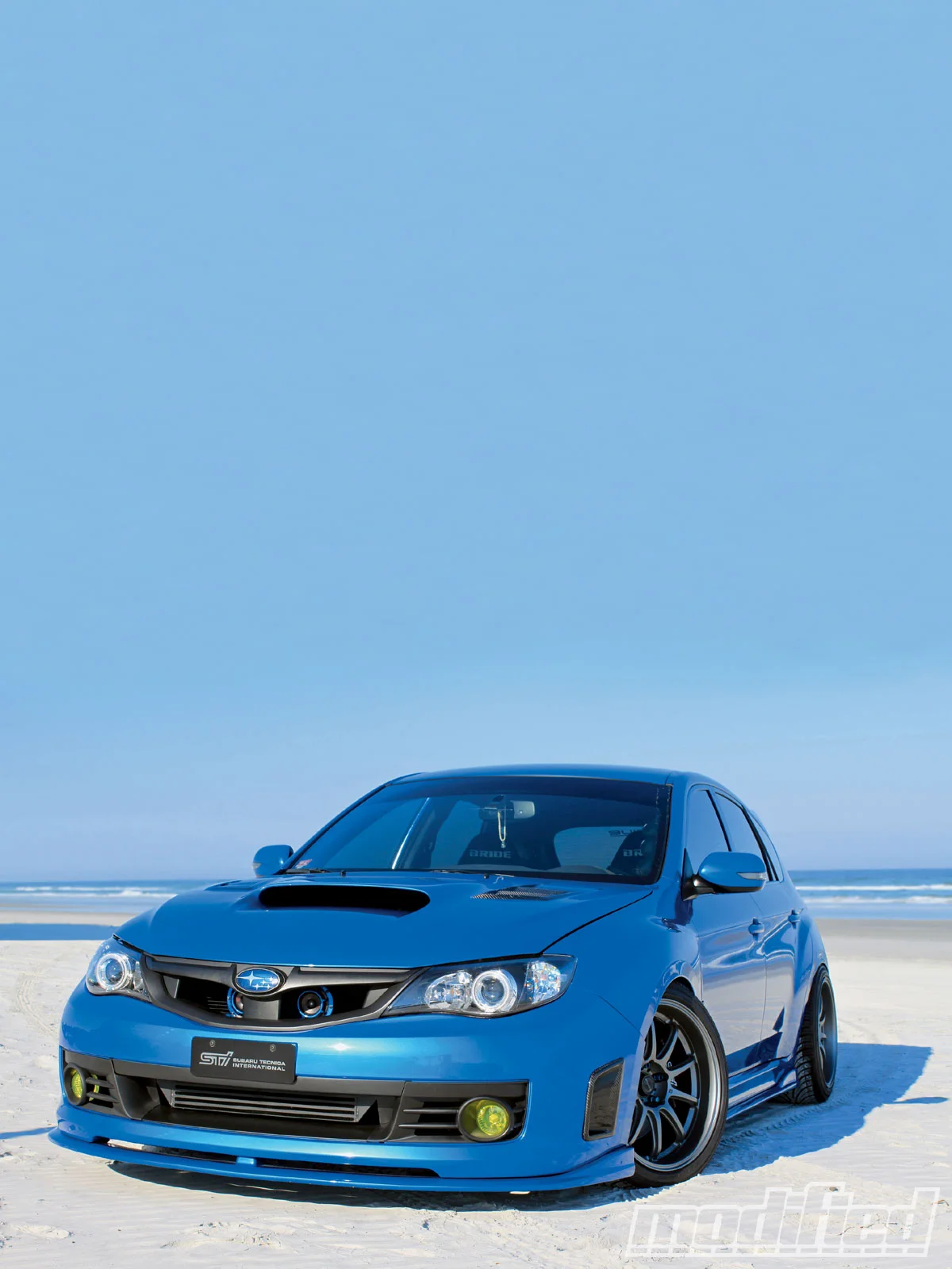 modp_1004_12_o+2008_subaru_impreza_sti+full_view.webp