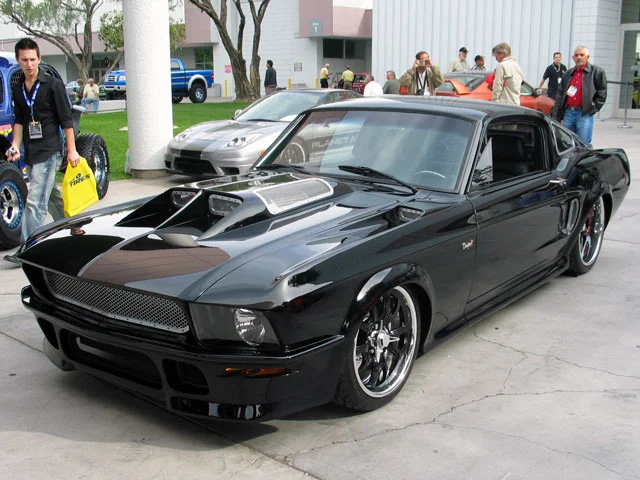 mufp_0703_9a_z+cars_from_SEMA_2006+autoworks_internation_obsidian_mustang.webp
