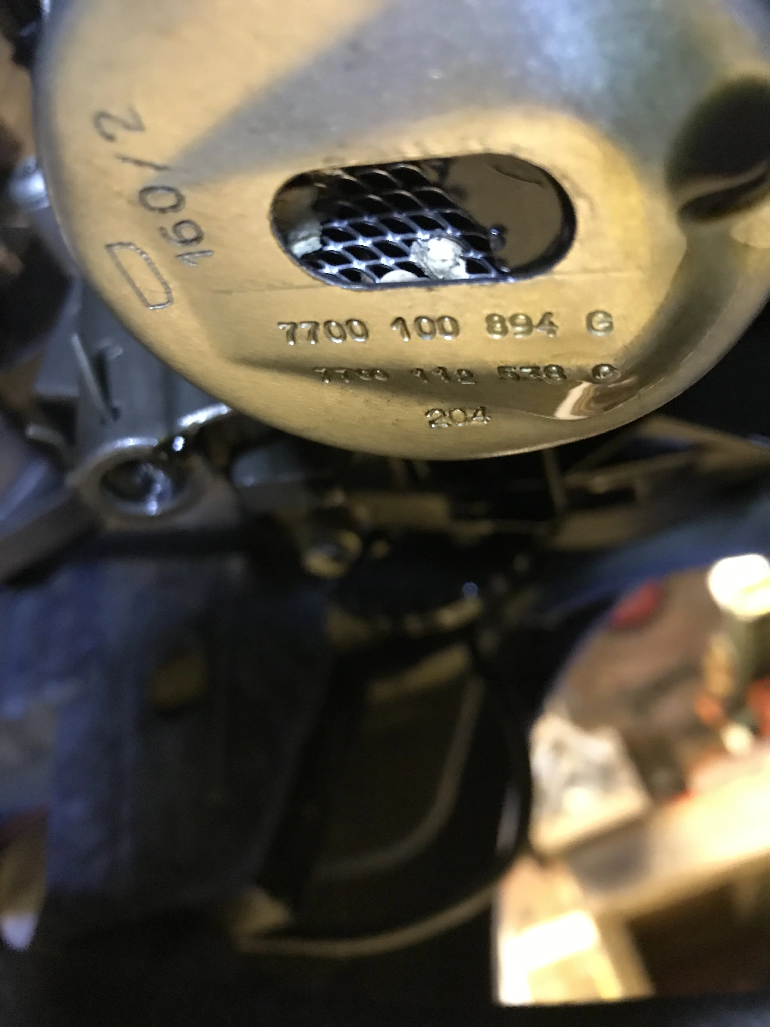 Oil pump strainer debris.webp