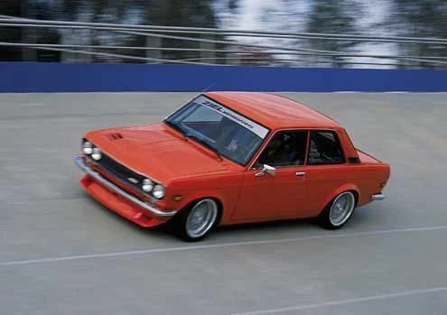 p100765_large+1973_Datsun_510+Front_Side_Driving.webp