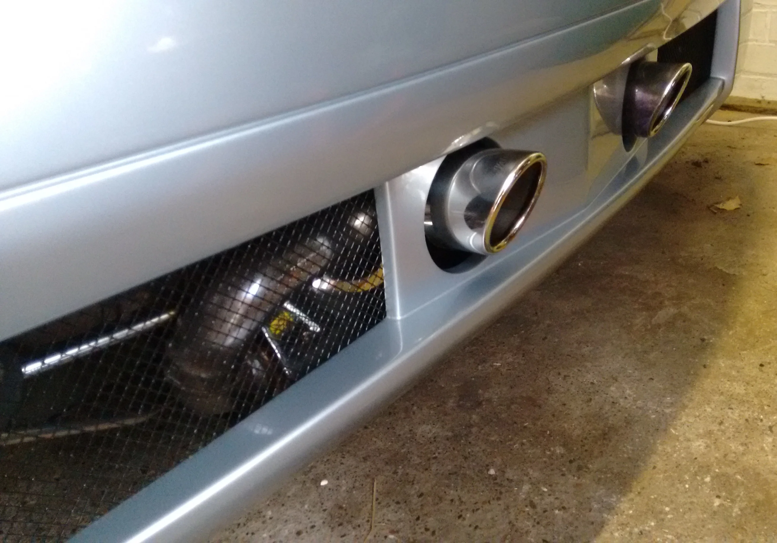 Rear bumper mesh painted and polished exhaust 2018.webp