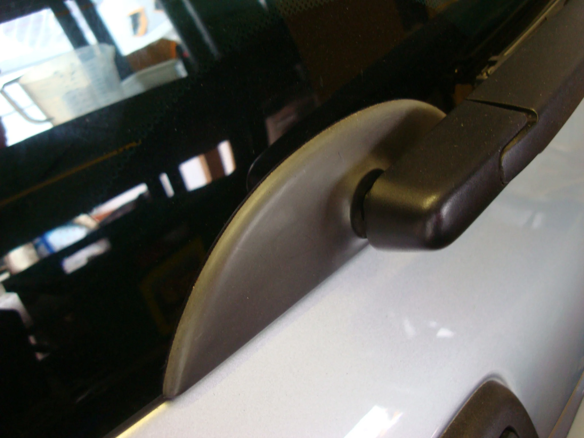 Rear wiper arm cover before.webp