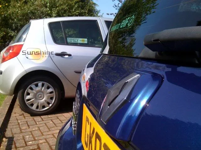 reargreybadge.webp
