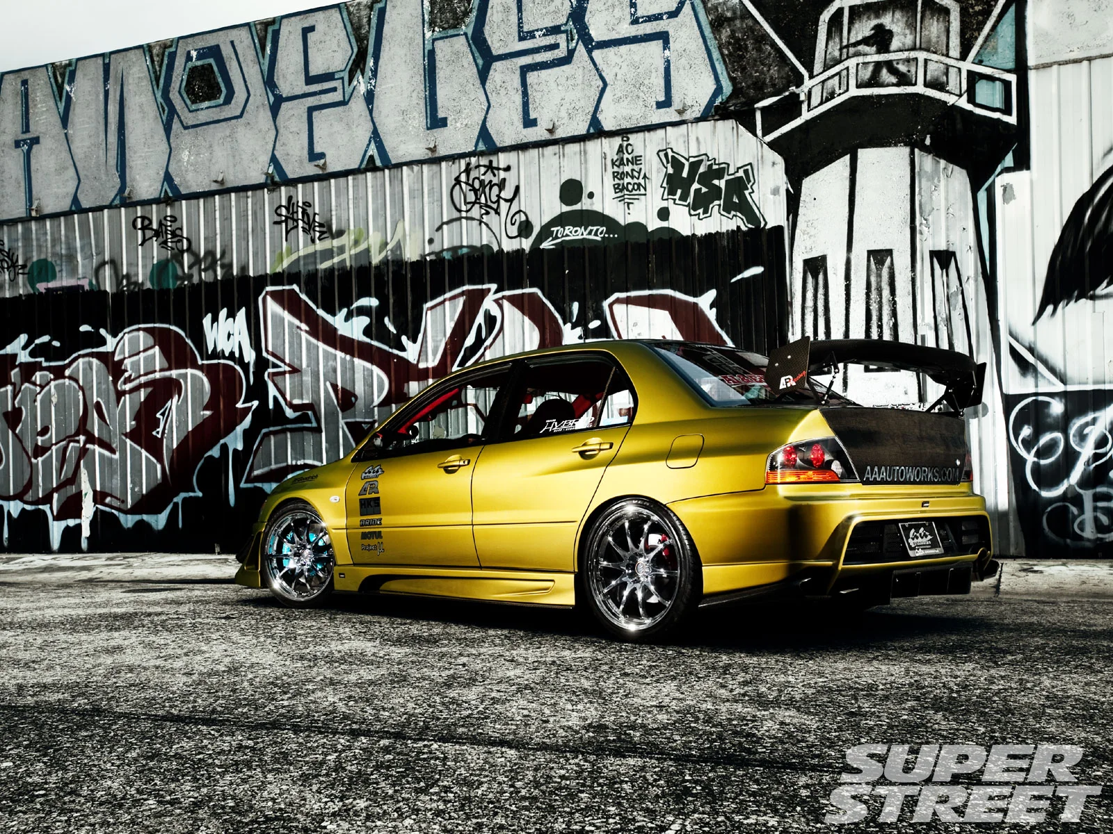 sstp_1003_02_o+2005_mitsubishi_lancer_evolution+rear.webp