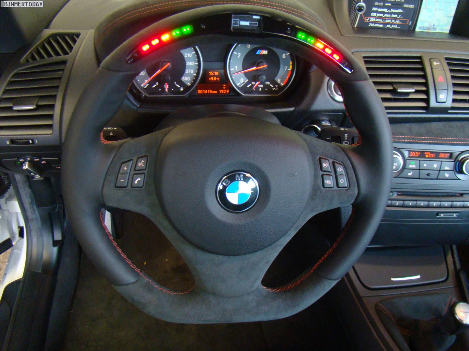 TVW-Car-Design-BMW-1-Series-M-interior-steering-wheel-details-with-LED-indicators.webp