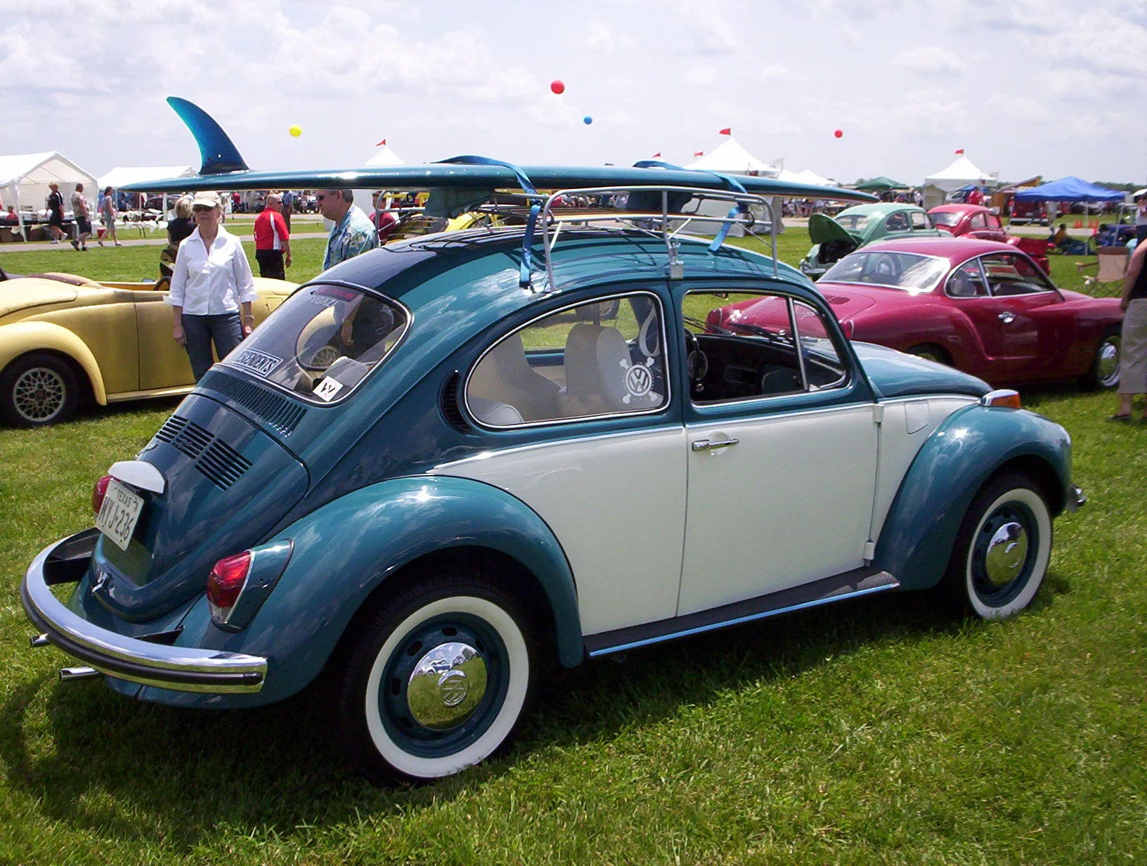 volkswagen-beetle-with-a-surfboard.webp