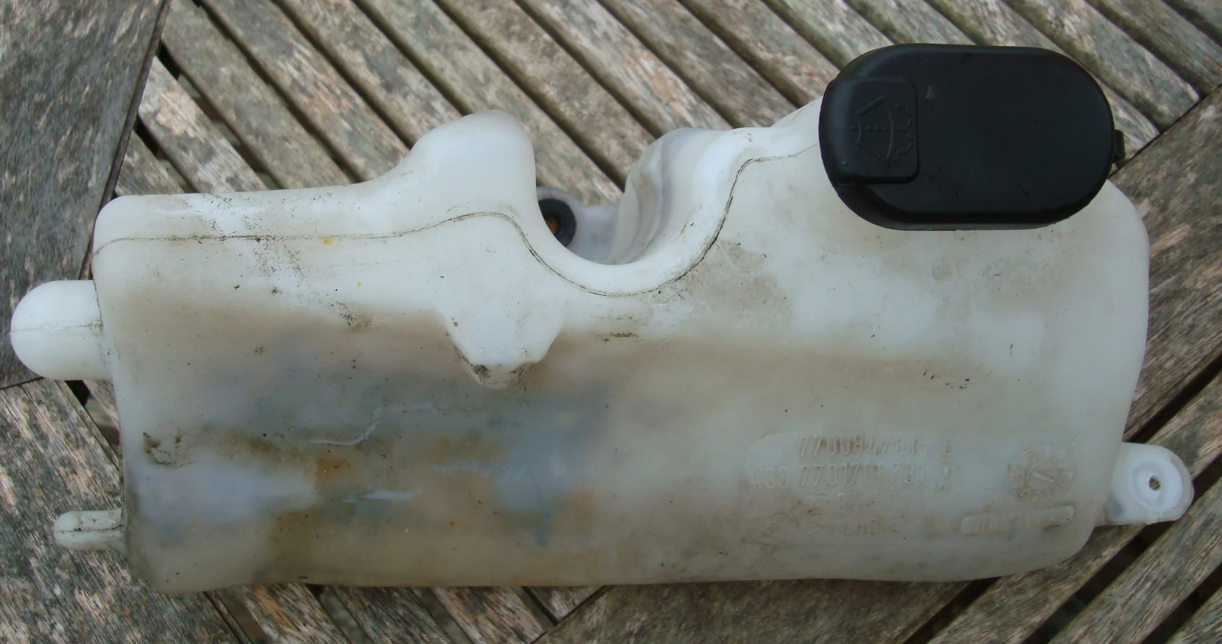 Washer bottle exterior before.webp