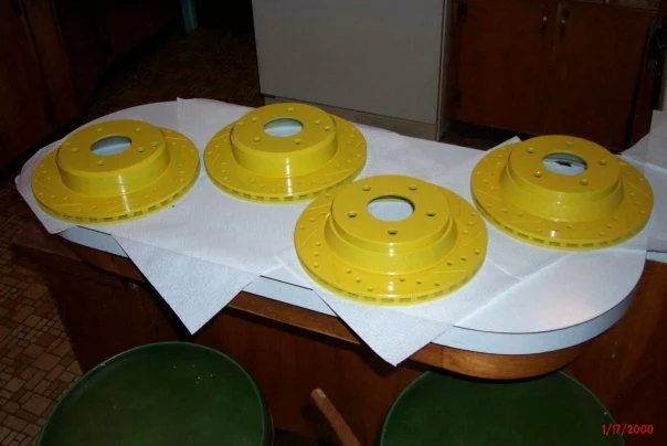 yellow-painted-brake-calipers.webp