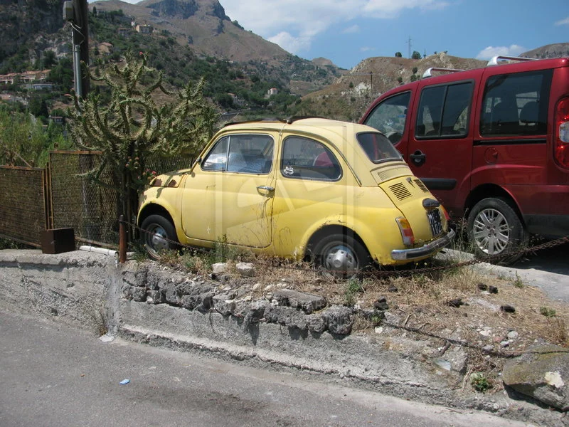 Yellow_Fiat_500_by_iansalter91.webp