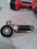 CLIO F4R AUXILLARY BELT TENSIONER with hoseclip.jpg