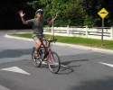 No_hands_cycling_over_speed_hump.webp