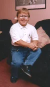 Eric_seated_smiling.webp