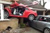 Red+Audi+TT+that+crashed+into+a+house+in+Suffolk.jpg