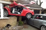 Red+Audi+TT+that+crashed+into+a+house+in+Suffolk.webp